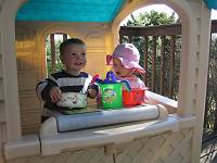  Kaylei's 2nd Birthday, Man at the Stove