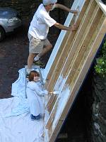  Underside of floor gets primer for moisture resistance.Cavities were filled with 2
