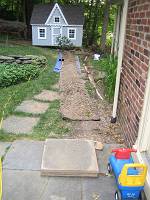  Exposed white is half-pipe protecting defunct condensor lines for former air-conditioning system.